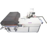 运用工业机器人技术的自动门襟钉扣机